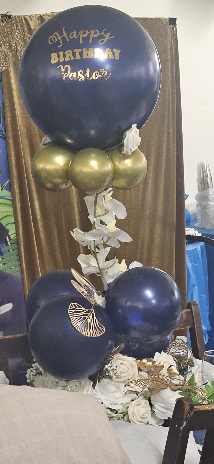 Balloon & Floral Centerpiece in Navy & Gold With Customized Vinyl Details by CapeNTiara Creations